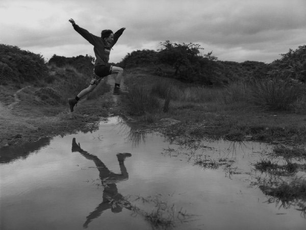  Jordan leaps across a puddle